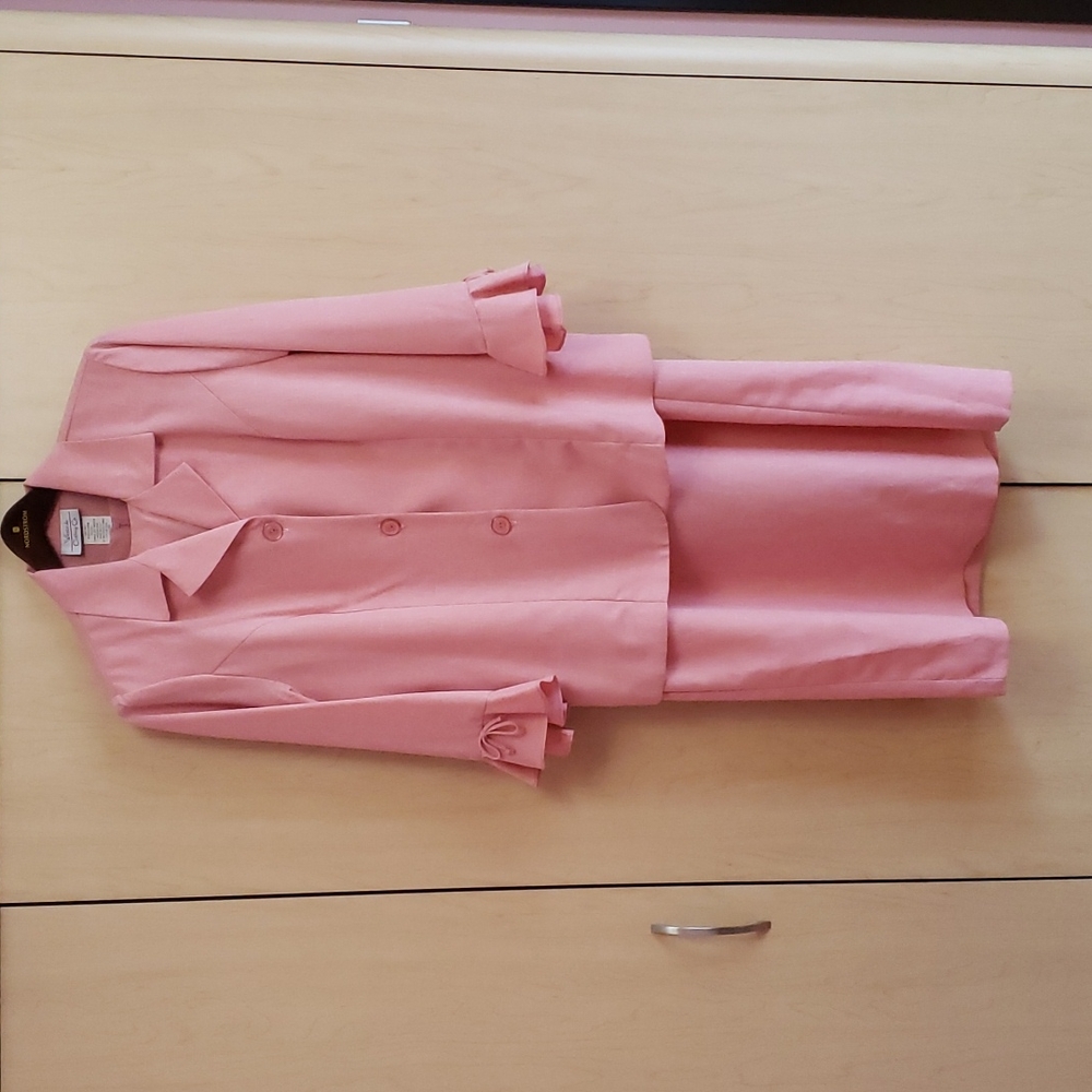 A long two-piece pink linen-like dress